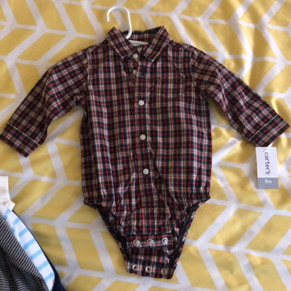 Six 9 month outfits.
